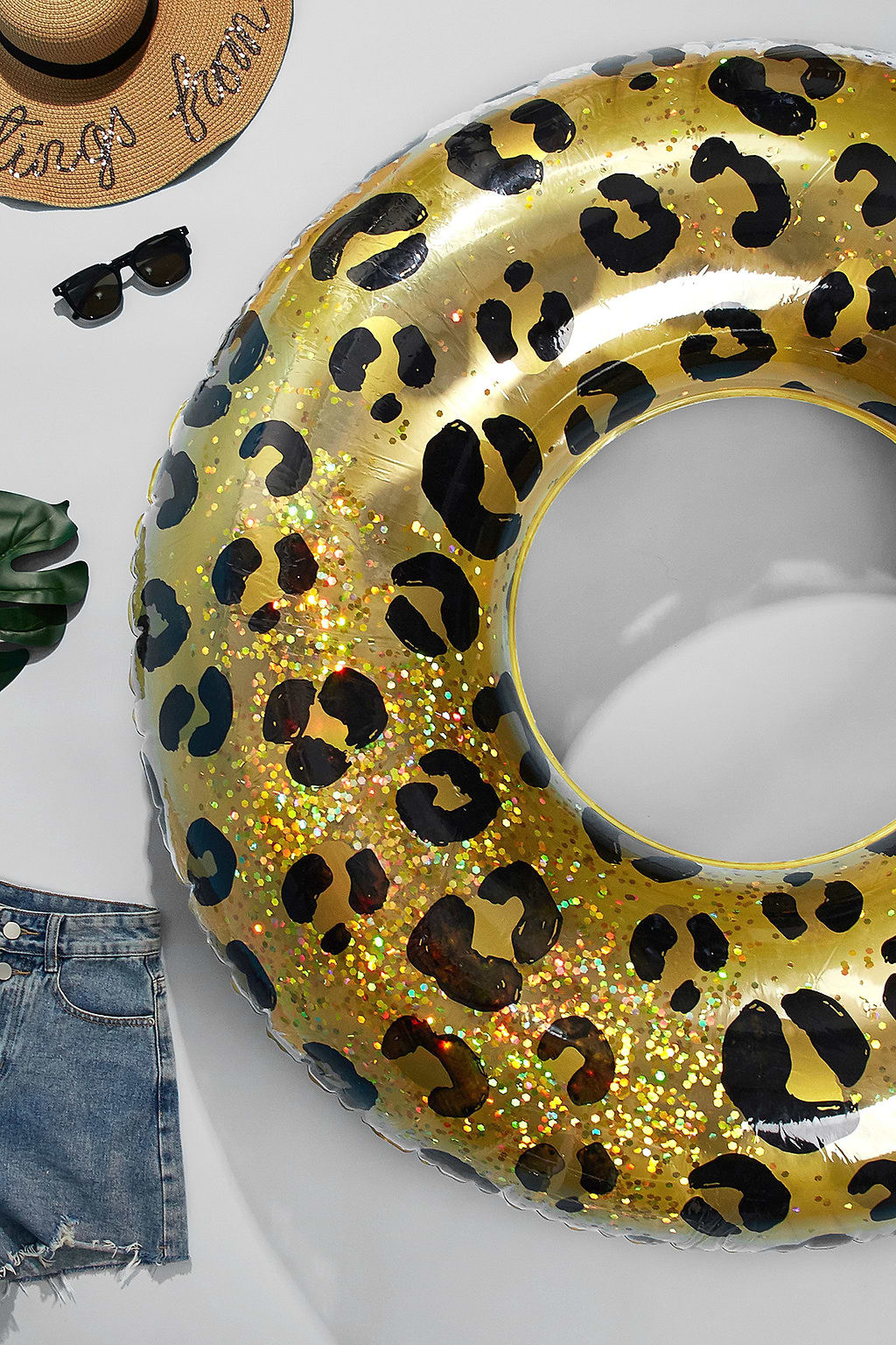 Glitterende luipaard zwembadvlotter