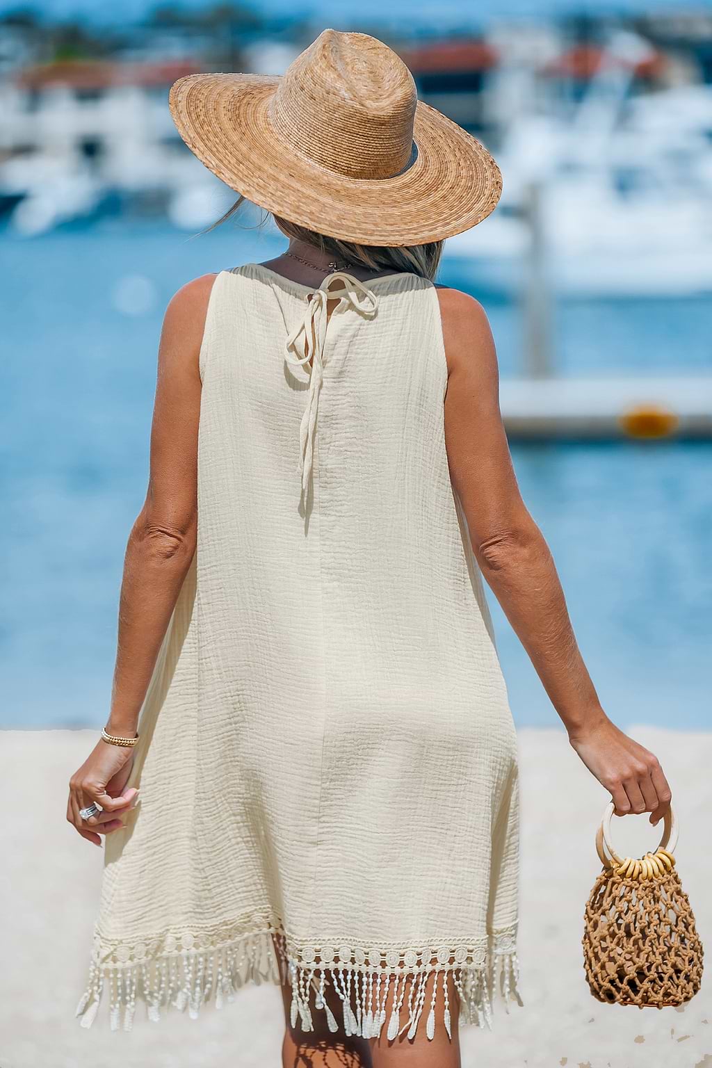 Apricot Boat Neck Tassel Hem Mini Dress