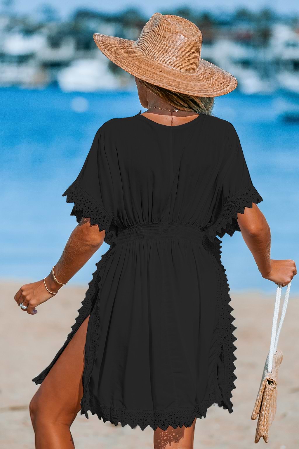 Zwarte kanten cover-upjurk met dolmanmouwen