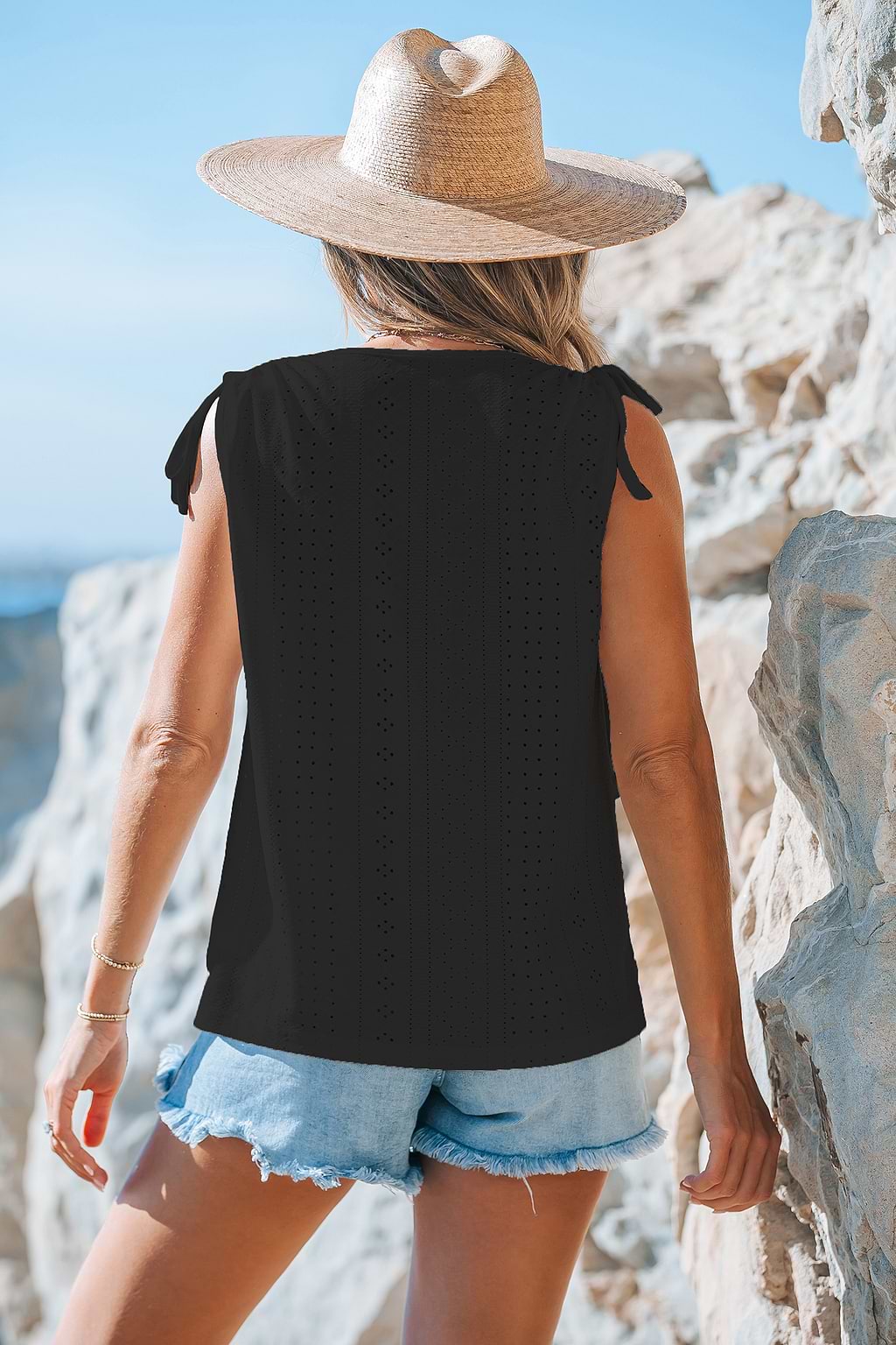 Camiseta sin mangas de jersey con botones delanteros y cuello redondo negra