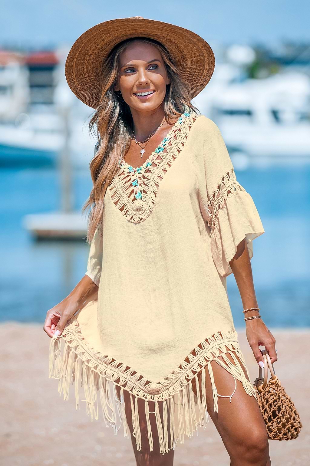 Vestido tipo pareo con borlas y cuello en V de crochet
