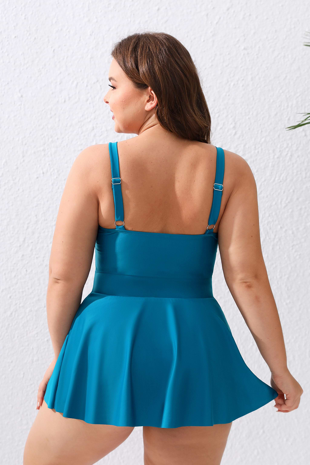 Blauwgroen gegolfde buikcontrole plus maat zwemjurk