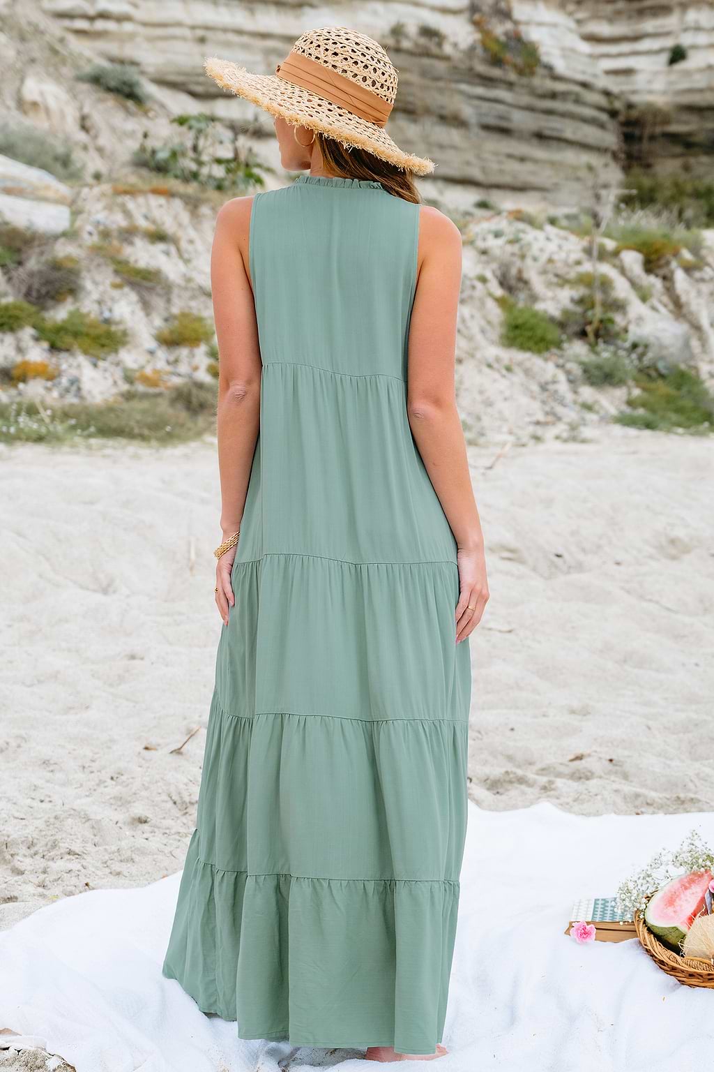 Groene mouwloze maxi-jurk met strikhals