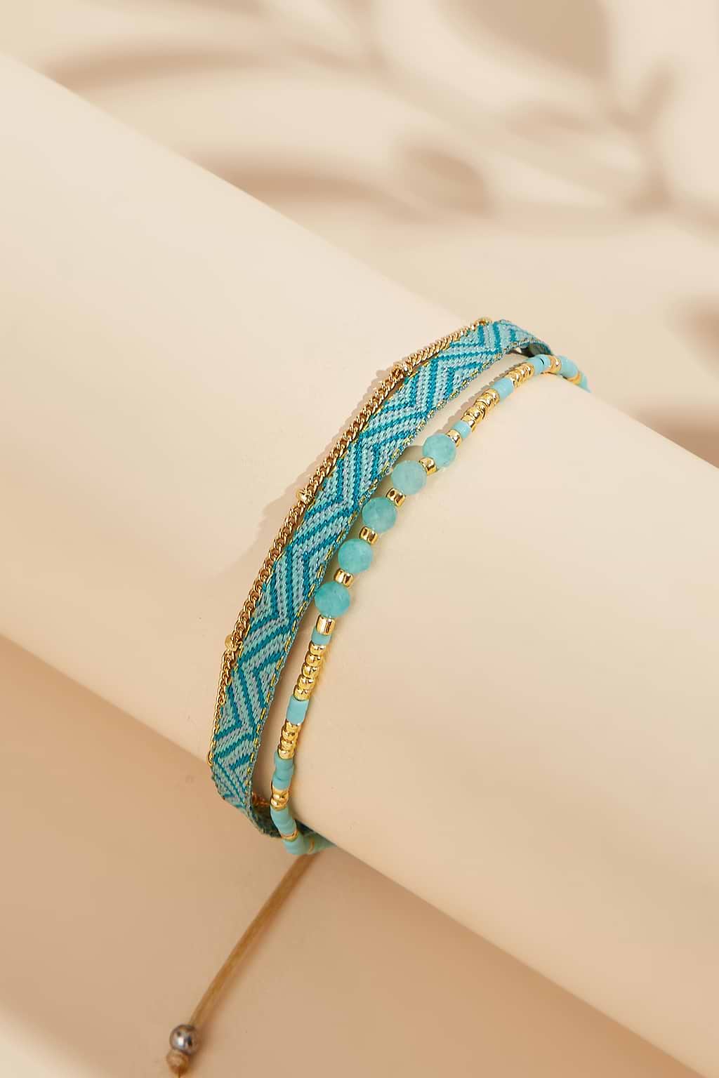 Conjunto de pulsera en tono dorado y turquesa sintética