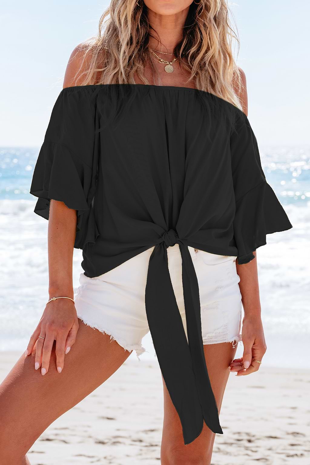 Blouse avec manches à volants et épaules dénudées noire