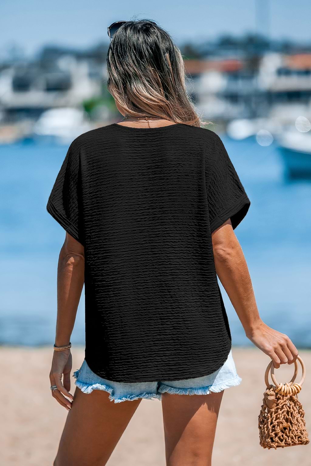 Schwarzes Strick-Top mit V-Ausschnitt und Dolman-Ärmeln