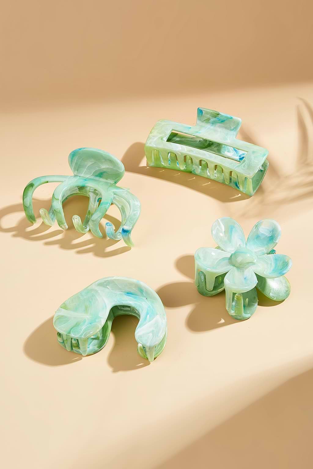 Pince à cheveux marbrée verte