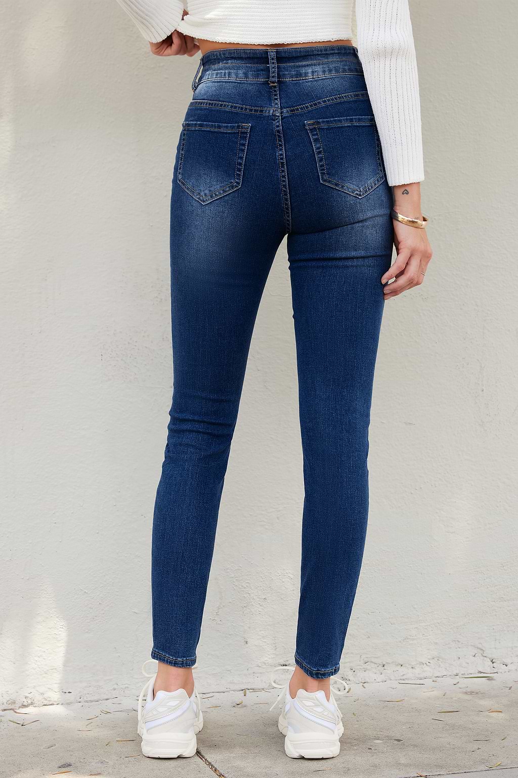 Skinny Jeans mit doppeltem Knopfverschluss