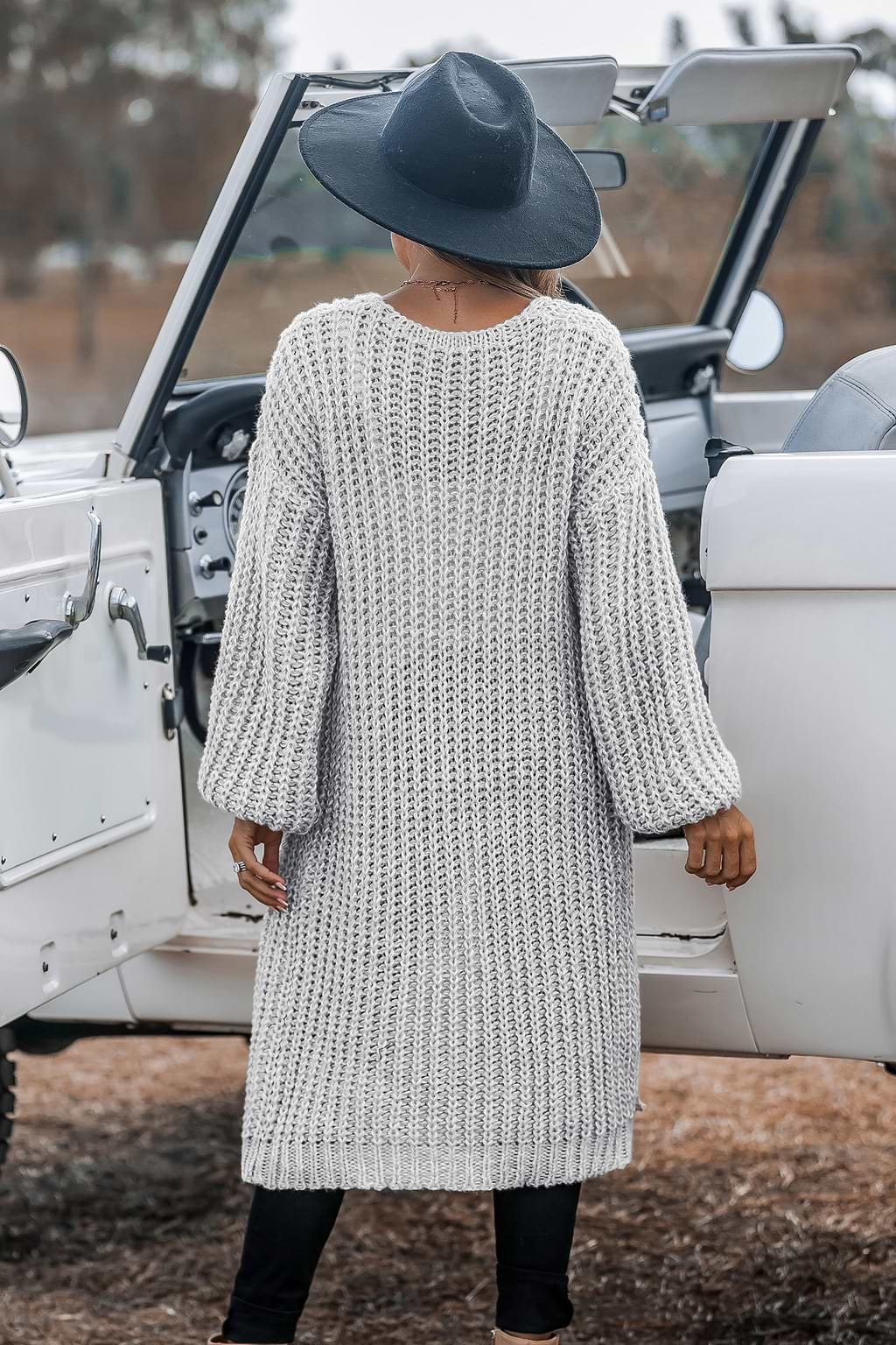 Abrigo de punto gris claro de manga larga con abertura delantera