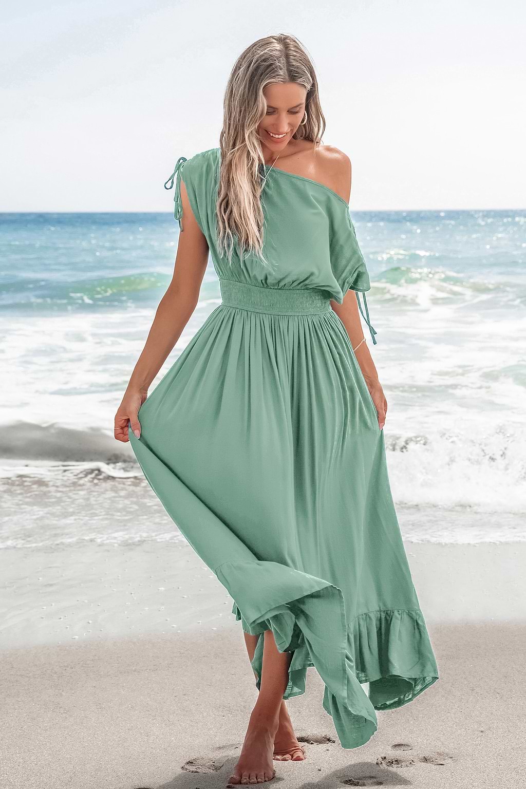Robe longue verte col asymétrique