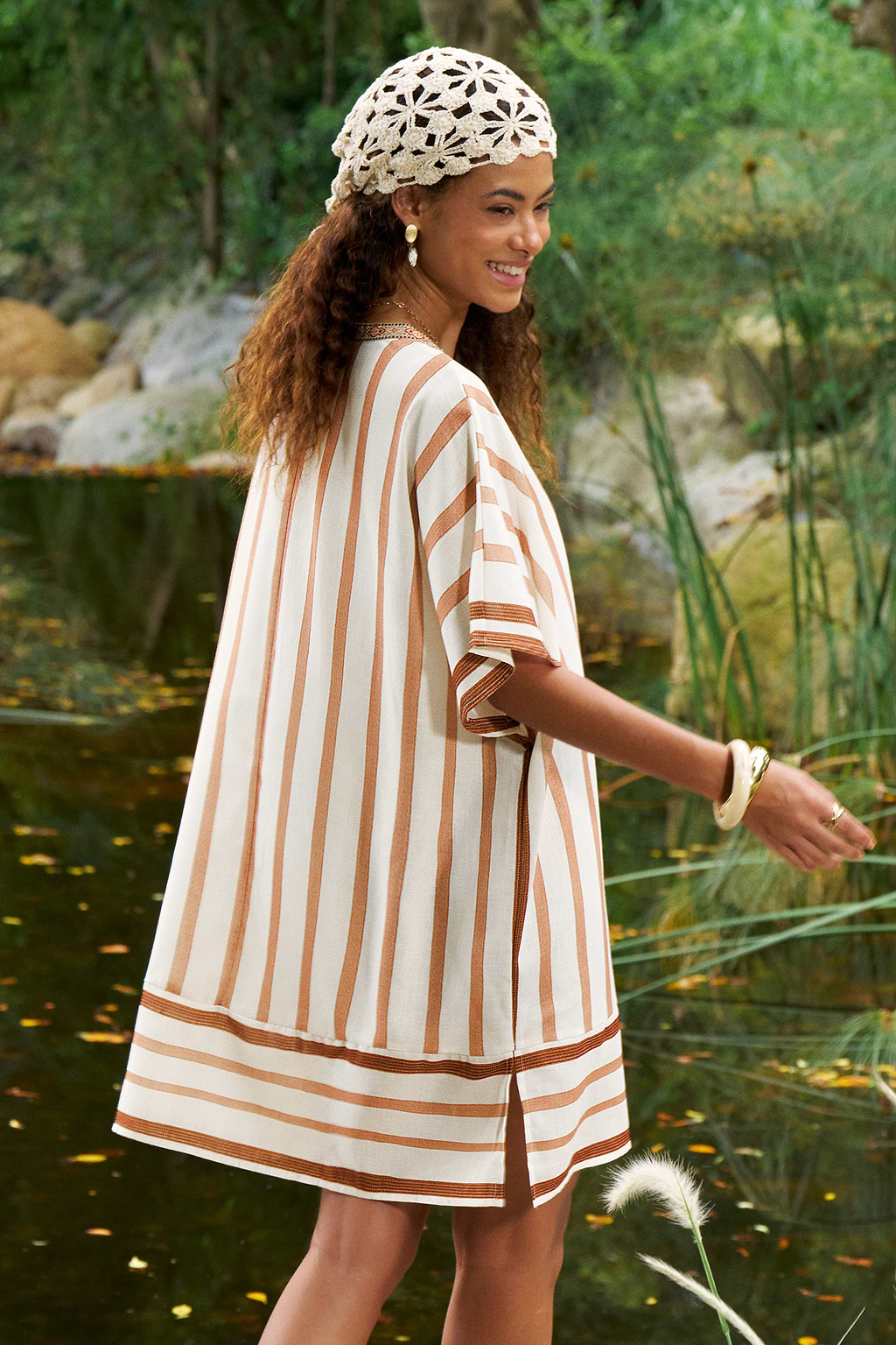 Mini-jurk met mediterrane sfeer als cover-up