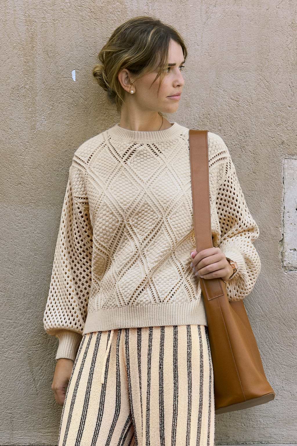 Pull beige en tricot manches longues