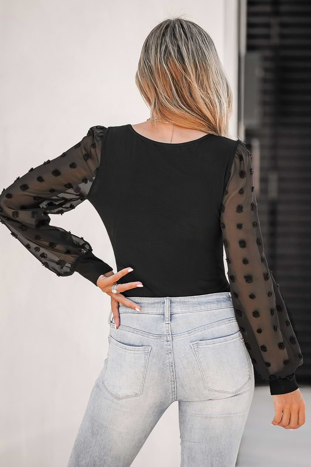 Body de canalé con lunares suizos