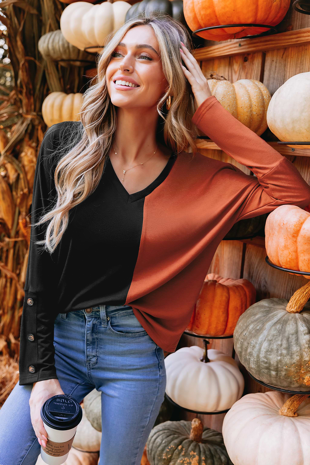 Tweekleurig T-shirt met lange mouwen en knopen