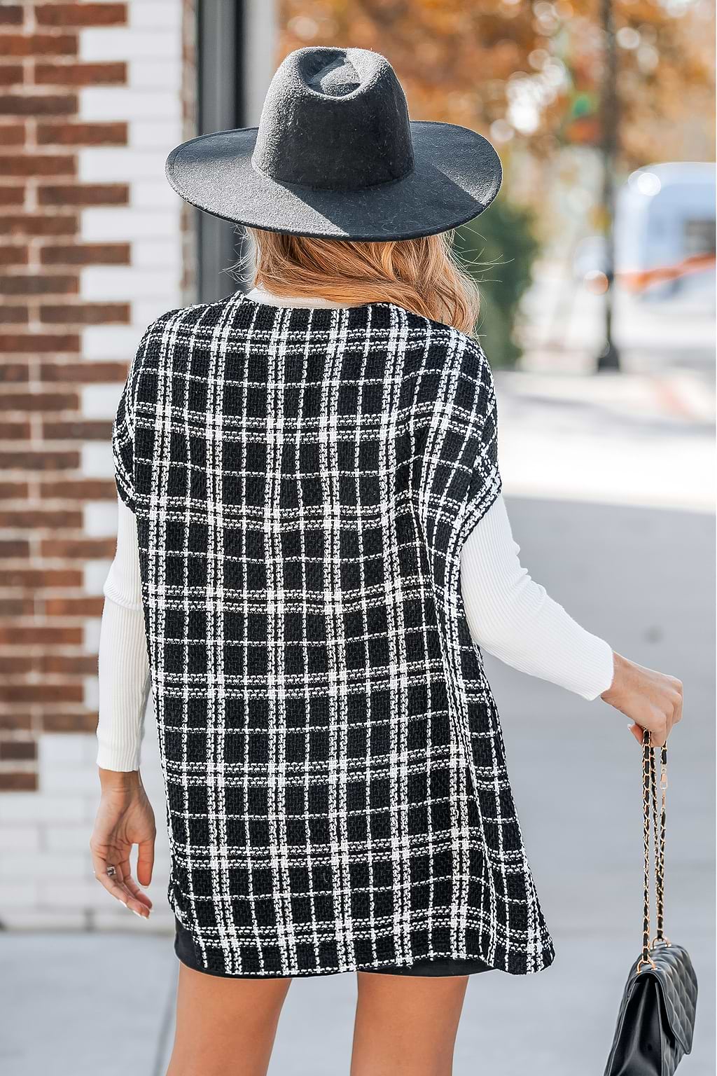 Abrigo sin mangas con botones a cuadros