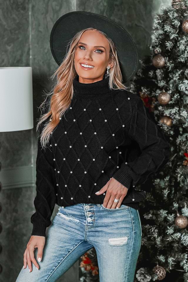 Pull à col roulé avec fausses perles