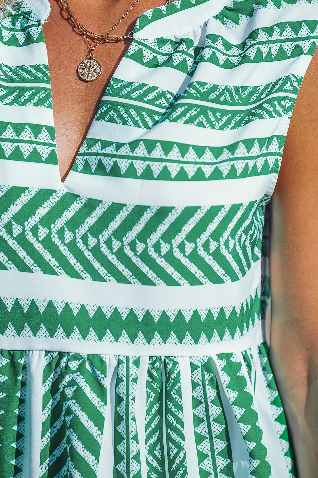 Robe mini géométrique verte et blanche
