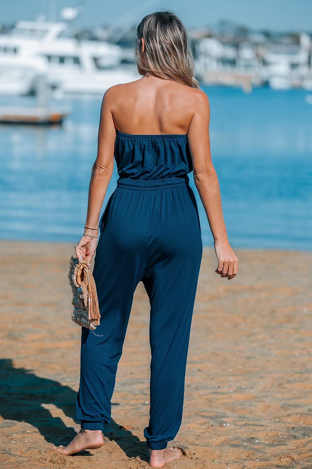 Toelopende jumpsuit met buis en strik
