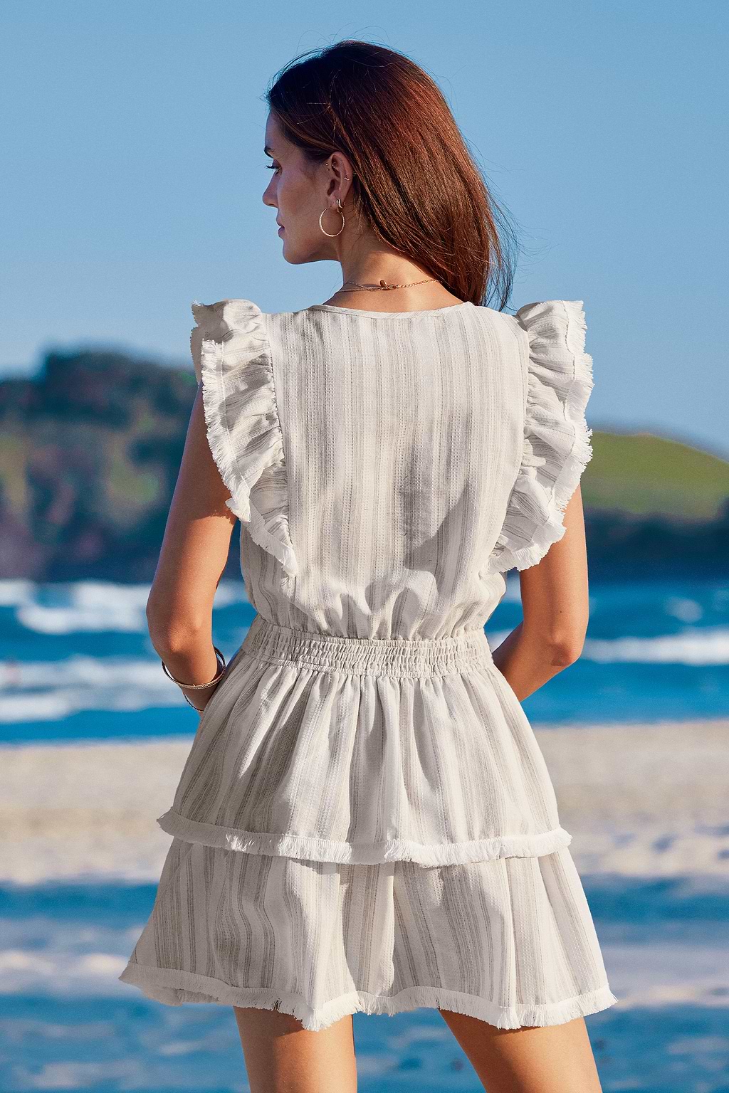 Robe mini à manches évasées et à glands et volants