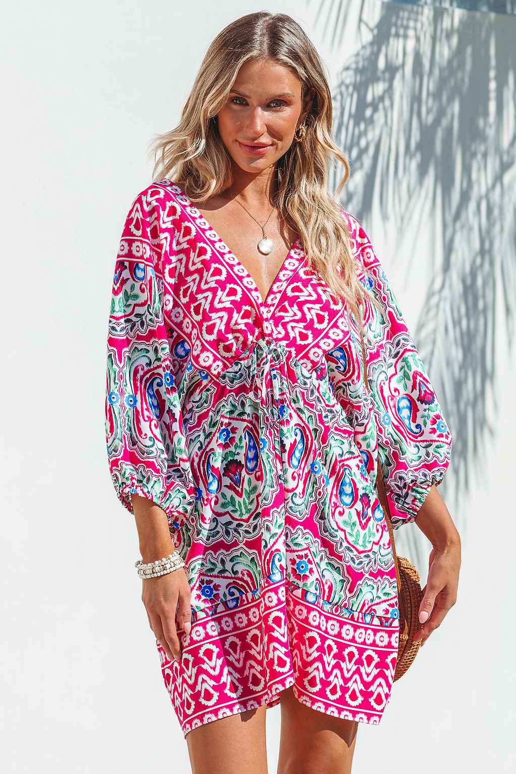 Minivestido con mangas abullonadas y estampado geométrico rosa