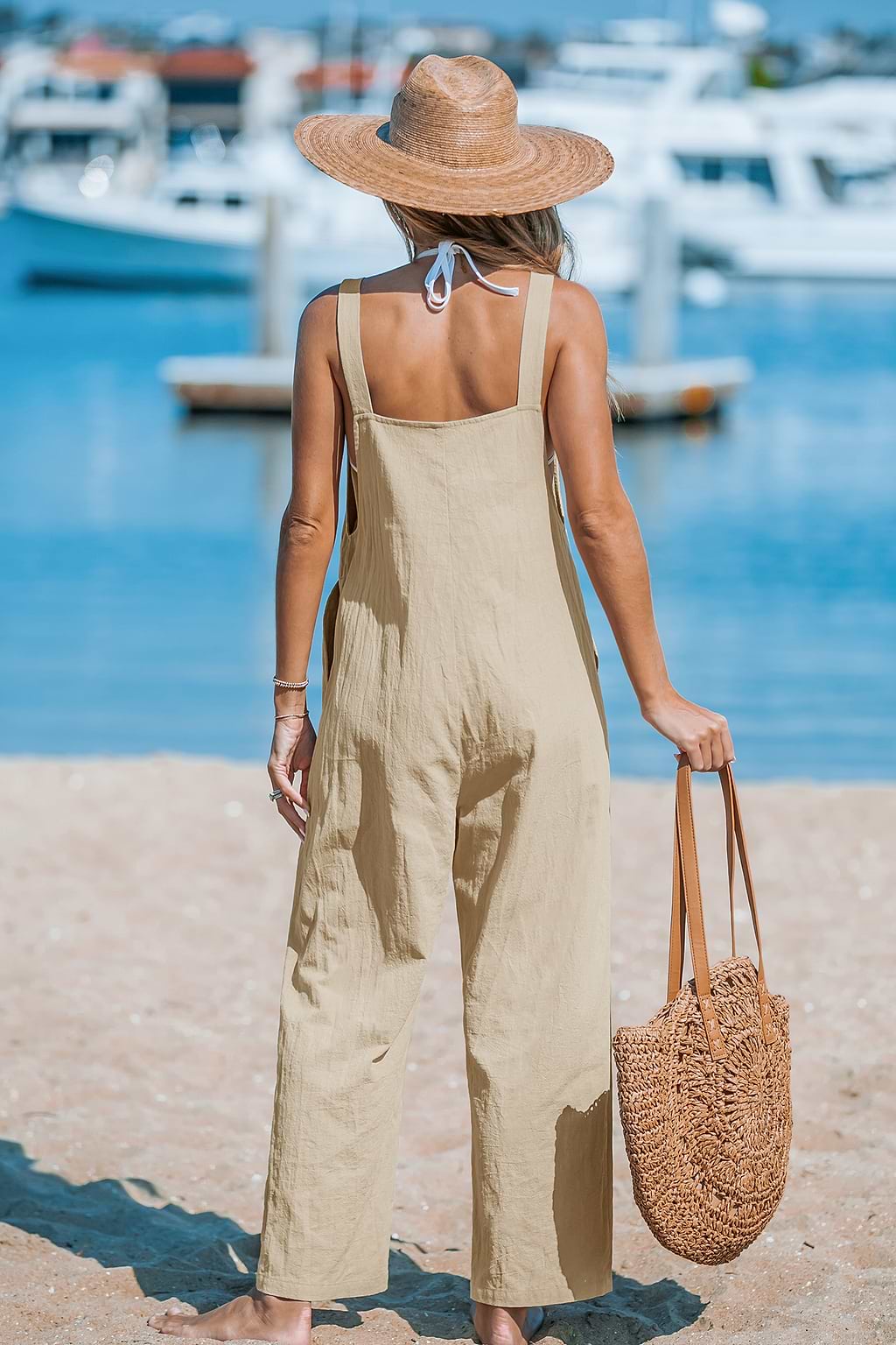 Taps toelopende schort-jumpsuit