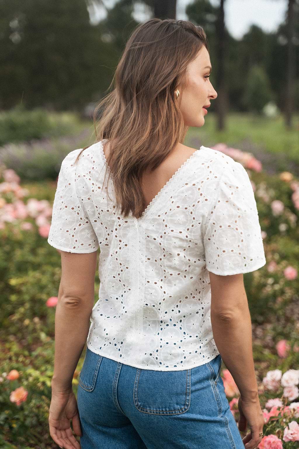 White V-Neck Flared Sleeve Eyelet Blouse