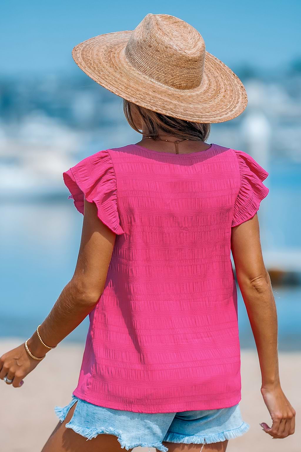 Haut à manches courtes et volants fuschia