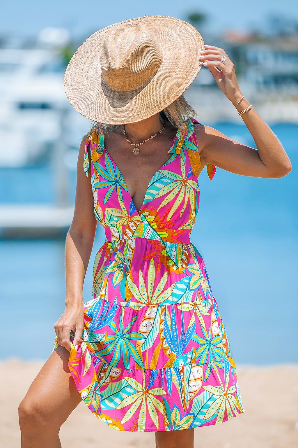 Robe mini avec bretelles à nœuds et imprimé tropical