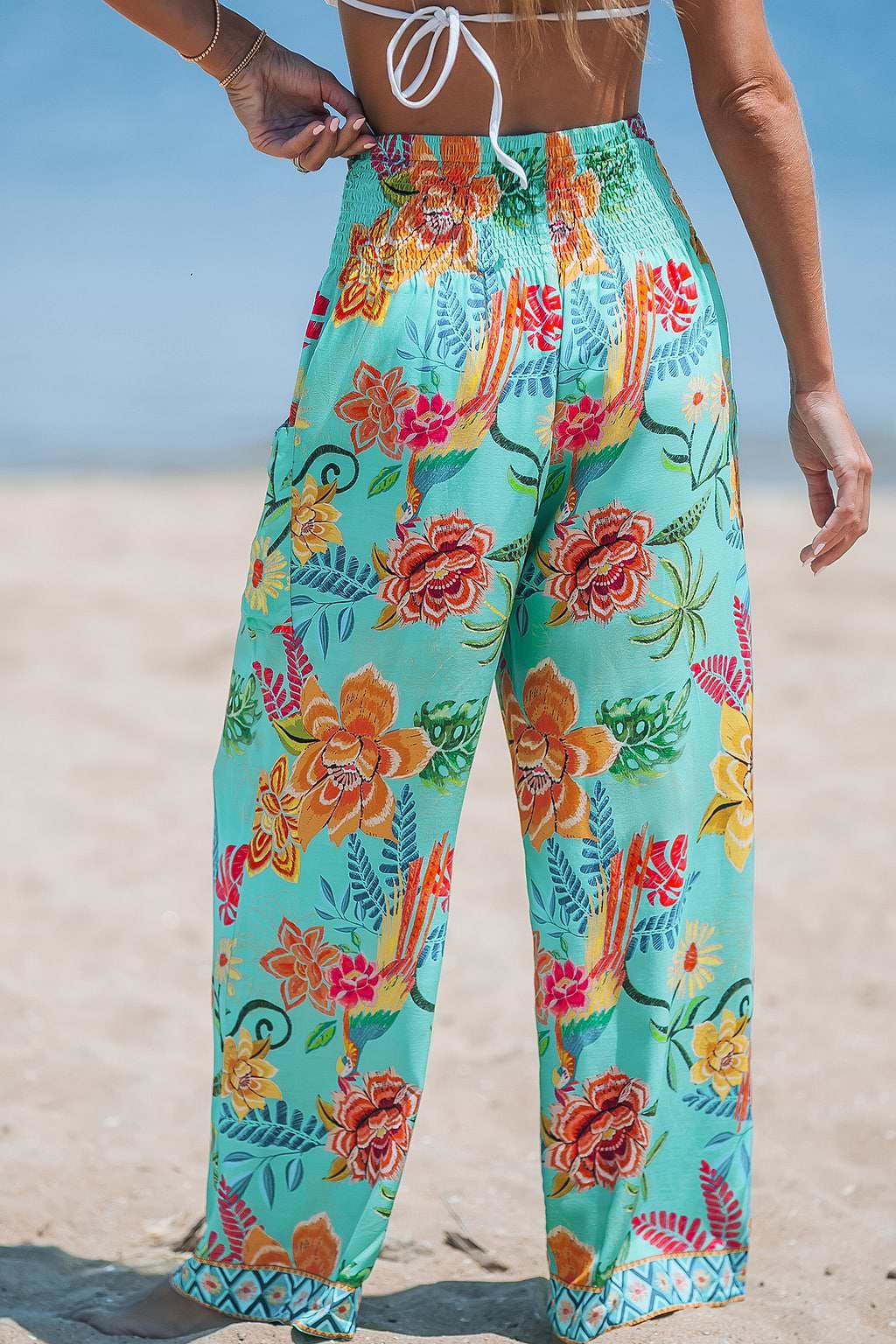 Pantalon taille haute à smocks et imprimé floral