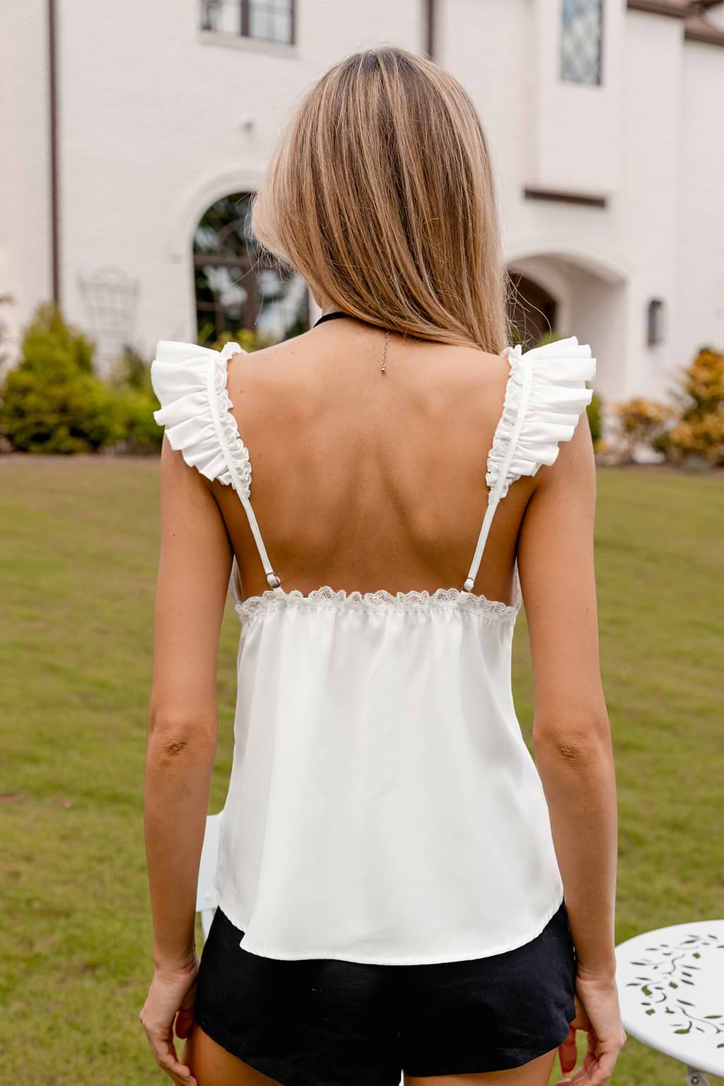 Débardeur en dentelle florale à col en V