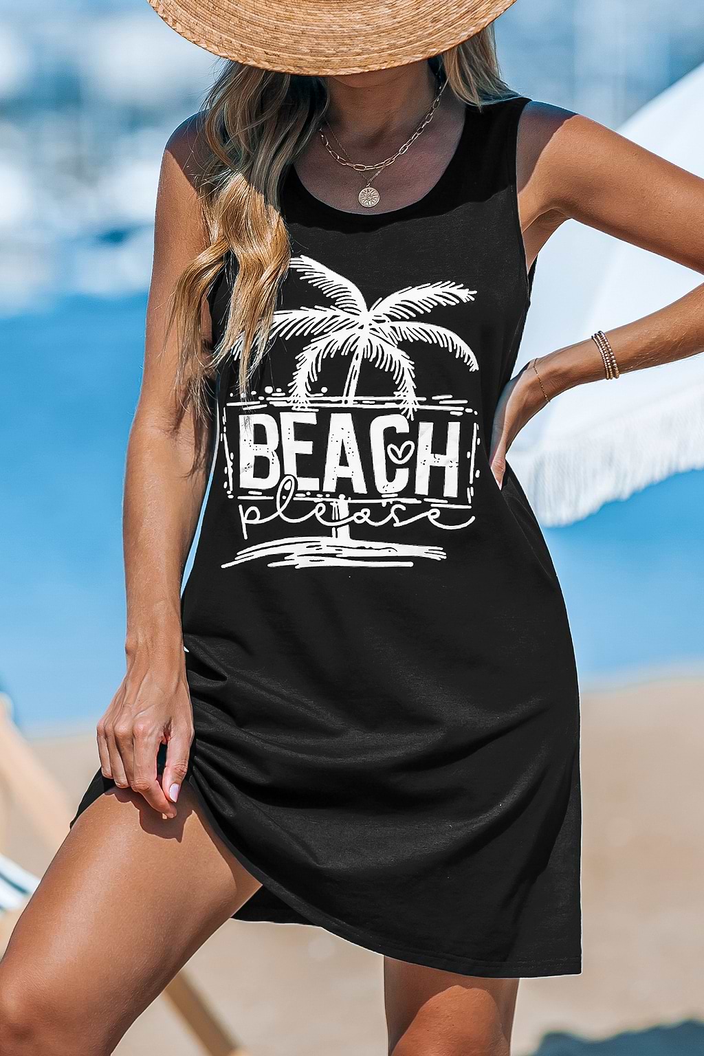 Minivestido playero negro sin mangas con cuello redondo