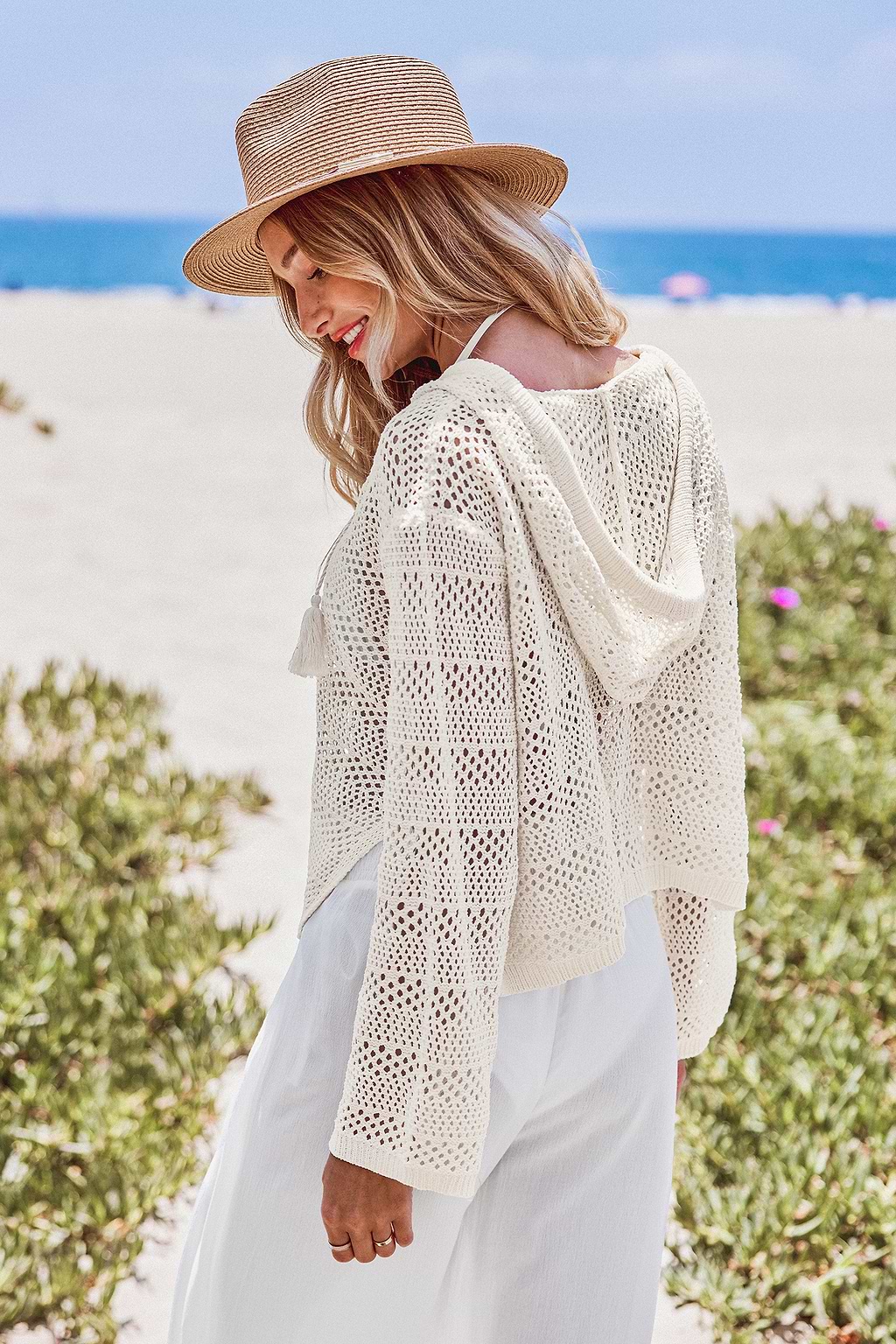 Langärmeliges gehäkeltes Cover-Up-Top mit Quasten