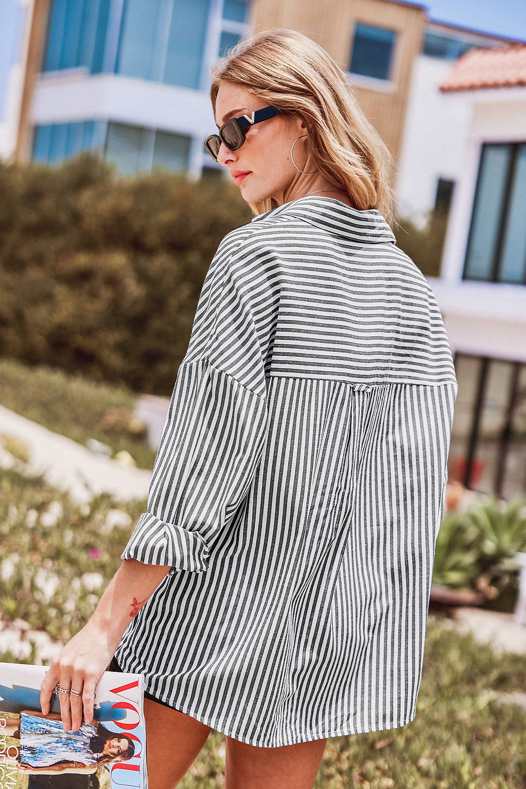 Haut à rayures et col de chemise avec manches longues et boutons