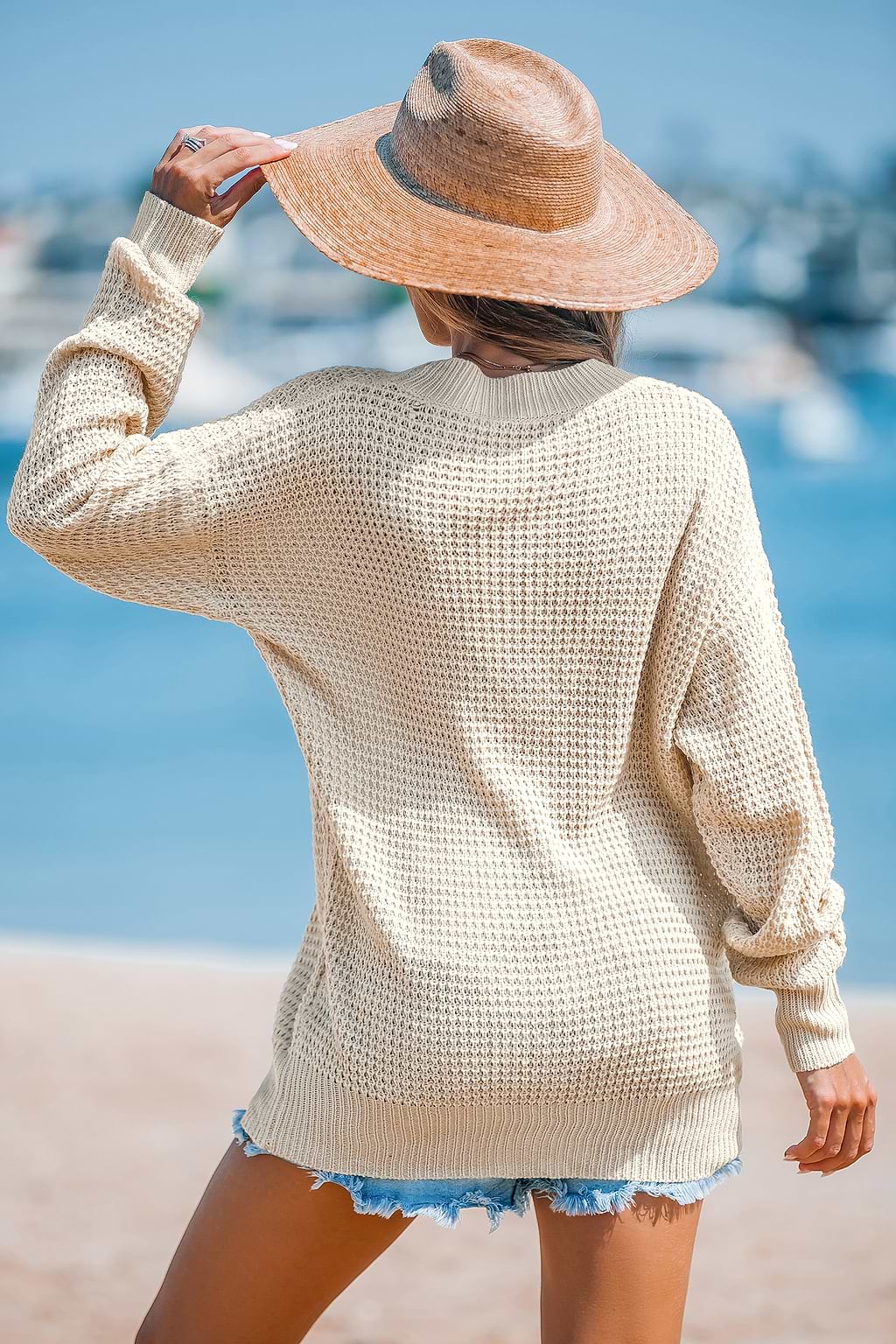 Aprikosenfarbener langärmeliger Cardigan mit Knopfleiste