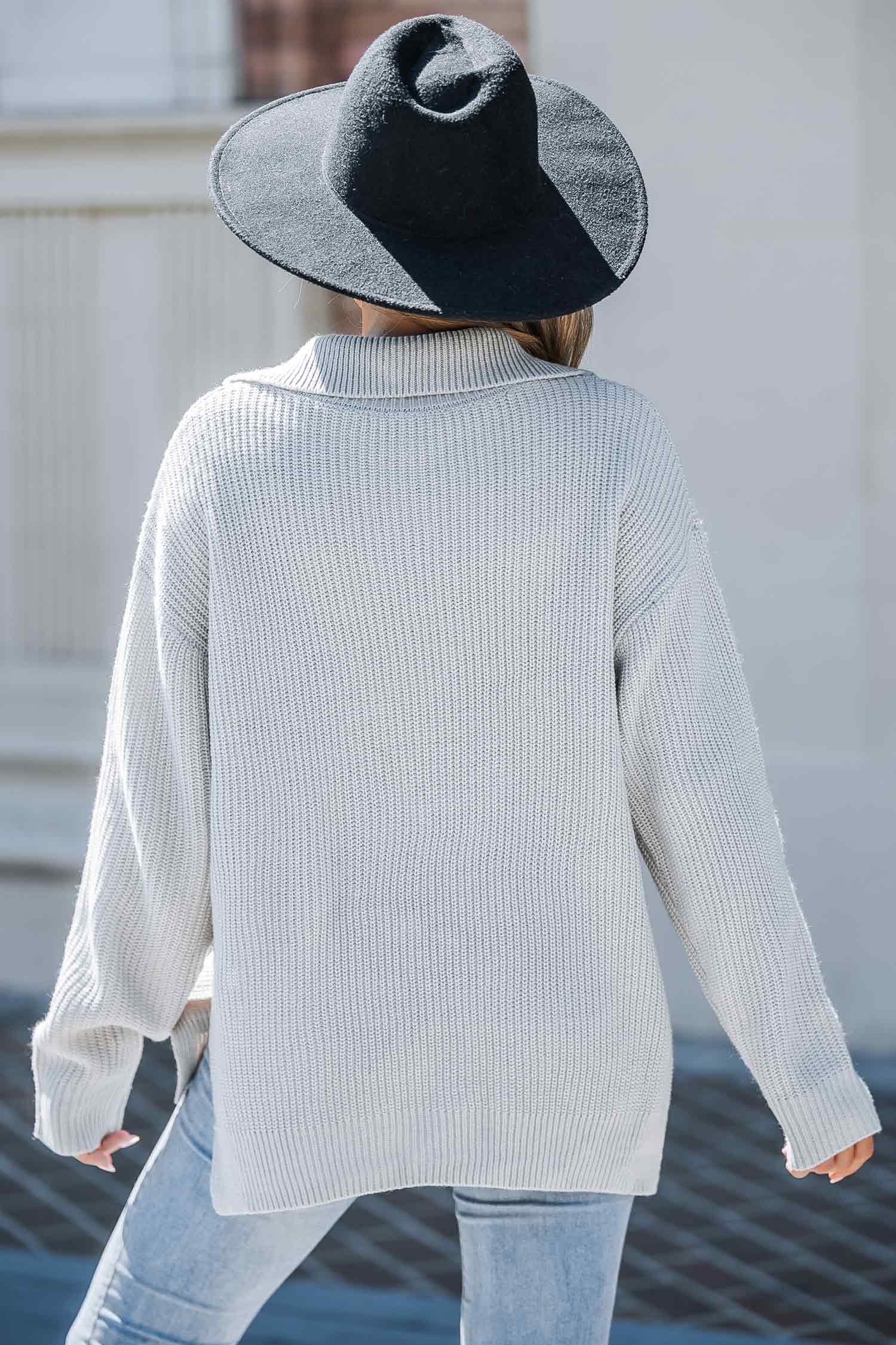 Grijze gebreide trui met kraag en gedeeltelijke rits