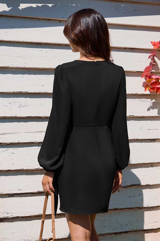 Zwarte ronde hals lange mouwen mini-jurk met strik aan de zijkant