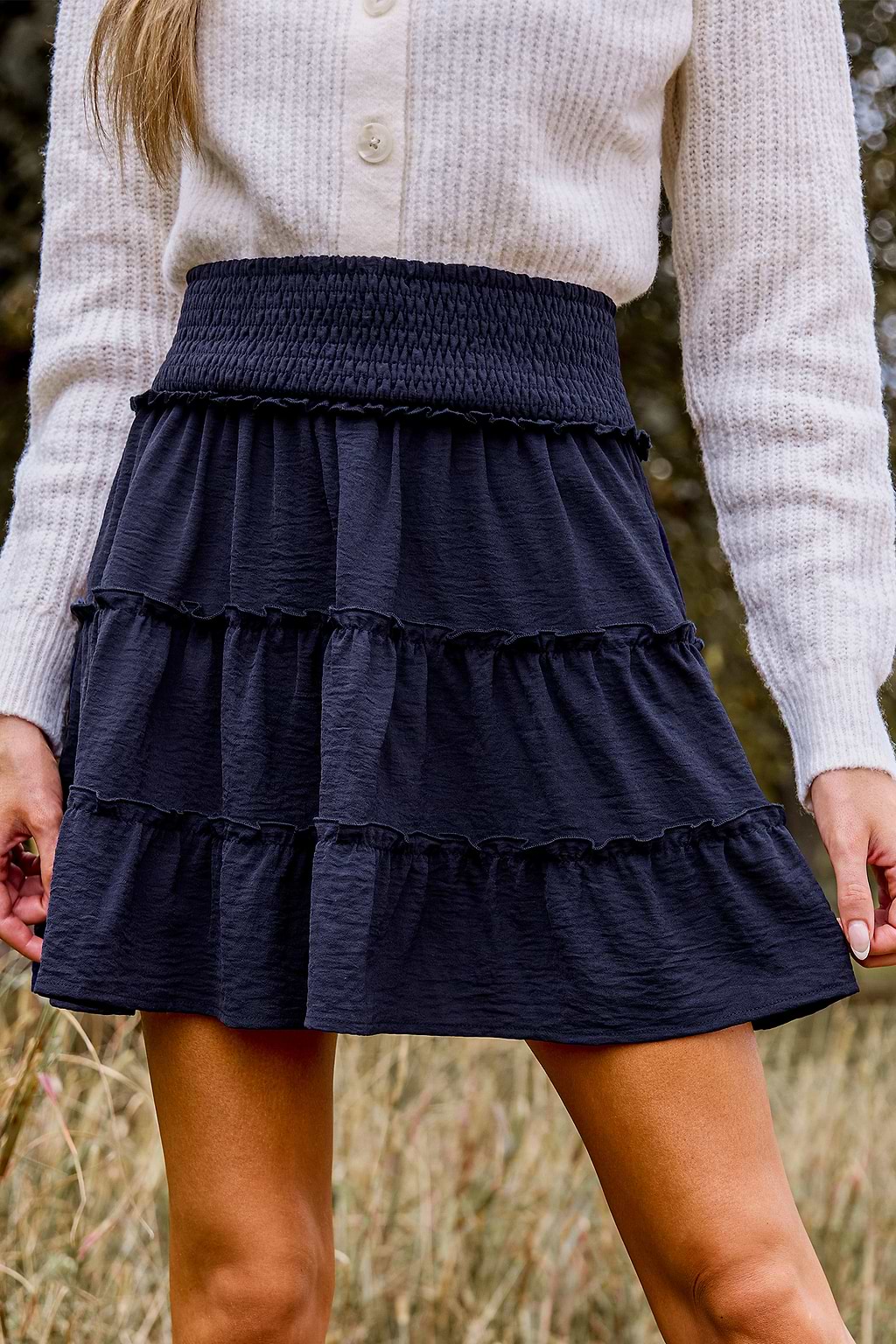 Jupe courte avec taille à smocks et micro volants bleue marine