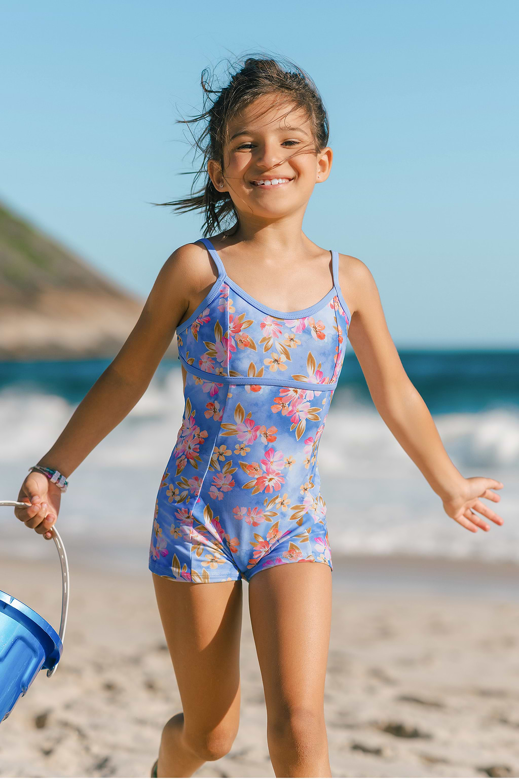 Maillot de bain une pièce florale bleue avec noeud dans le dos