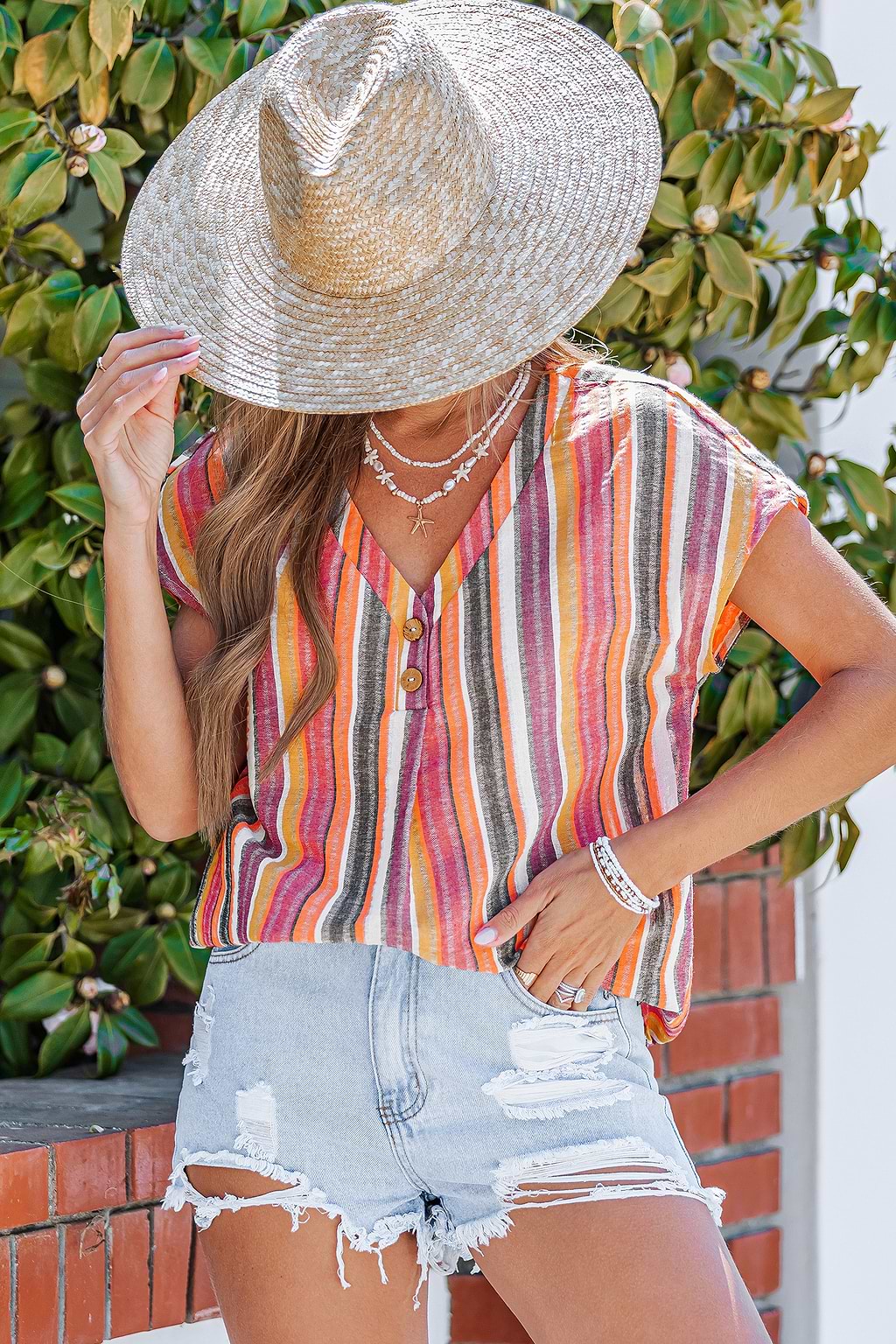 Top à rayures col V détail bouton