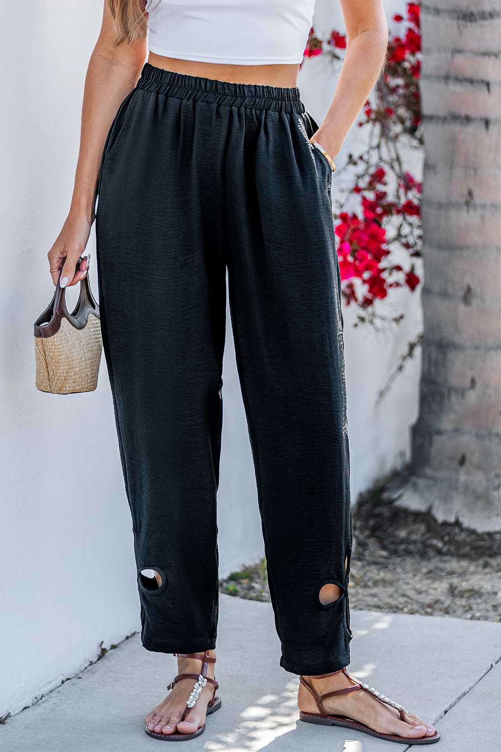 Pantalon noir jambe fuselée à poches