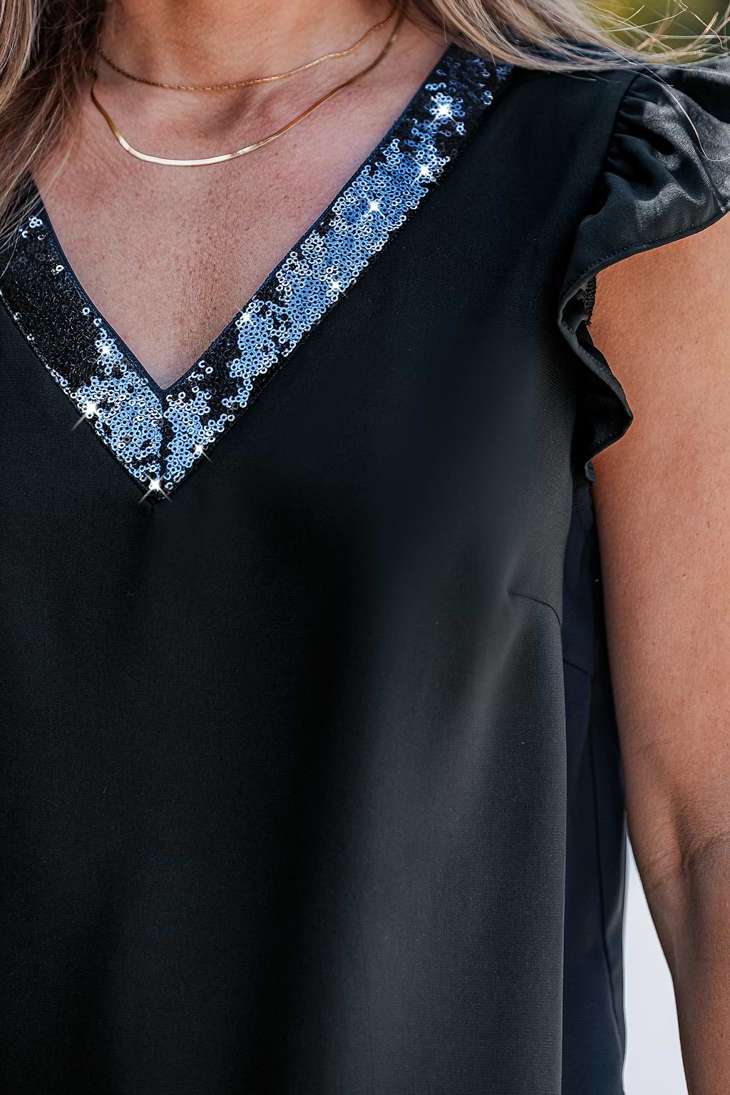 Glanzende zwarte top