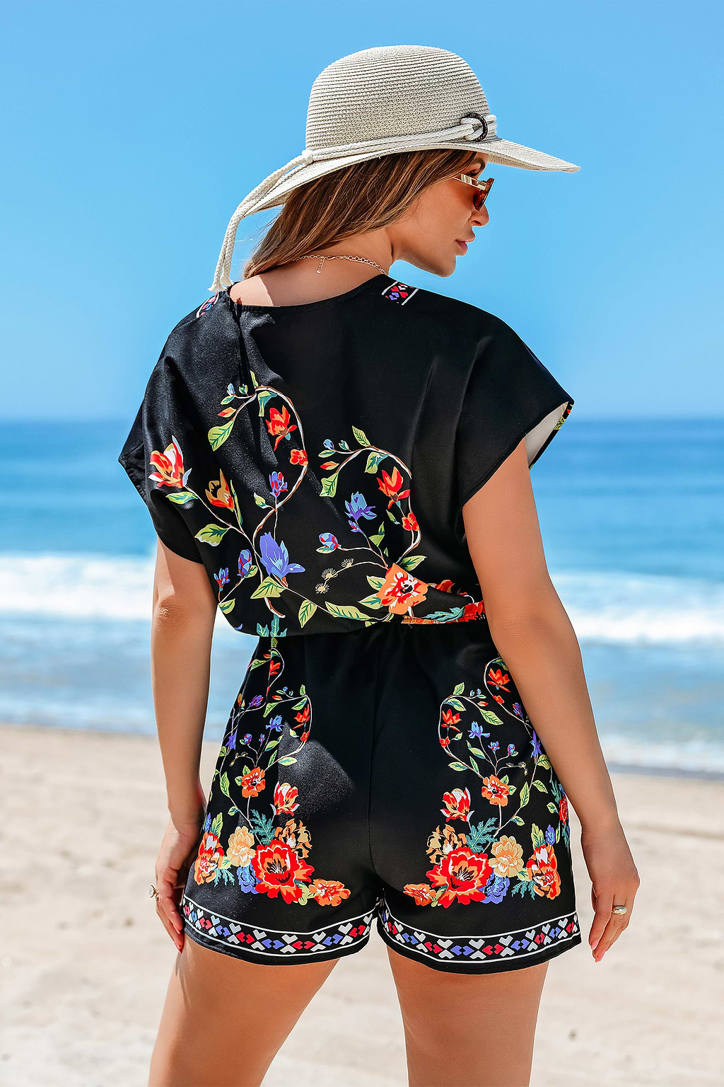 Hibiscus Glow Tropical Romper