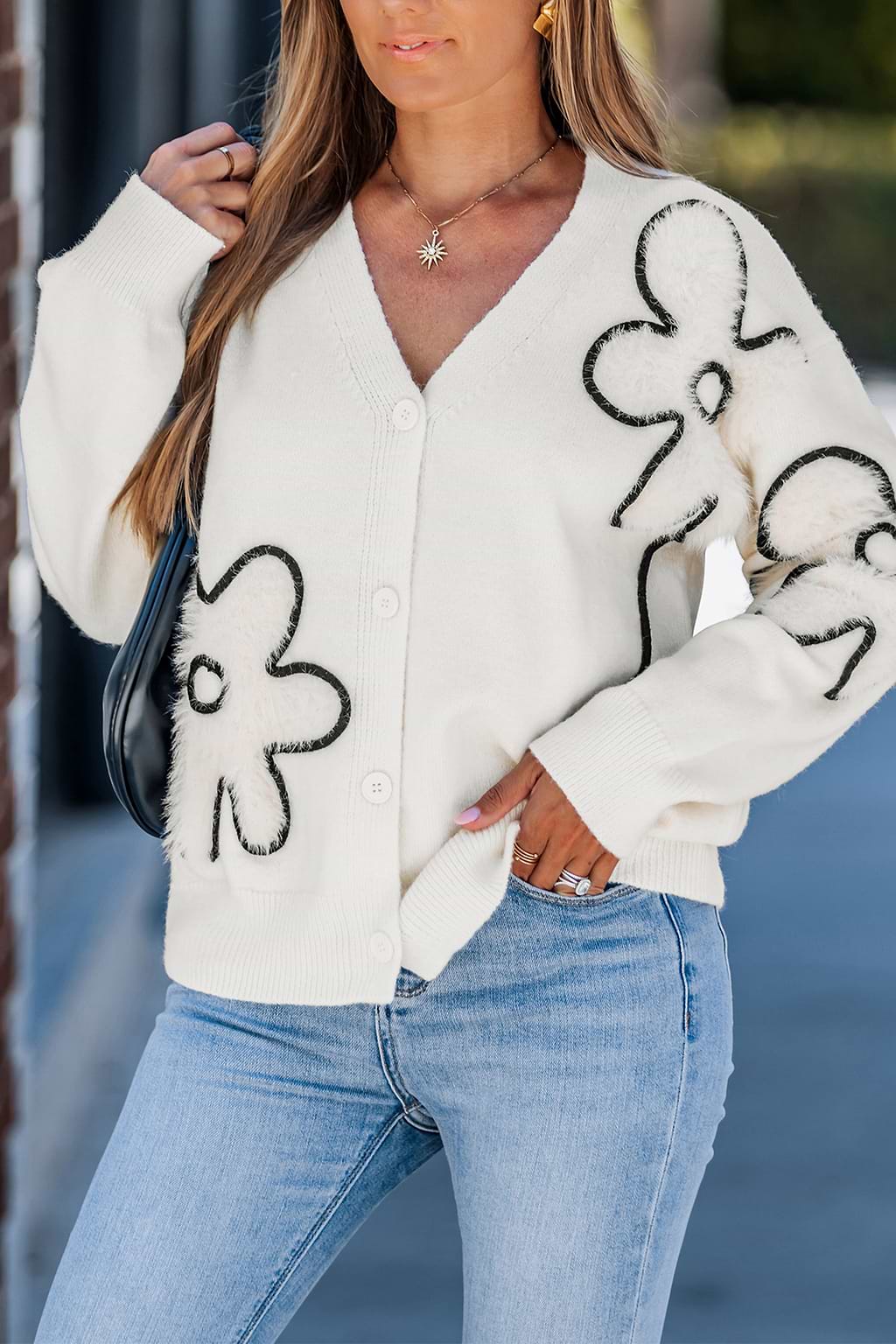 Cardigan crème en tricot col V