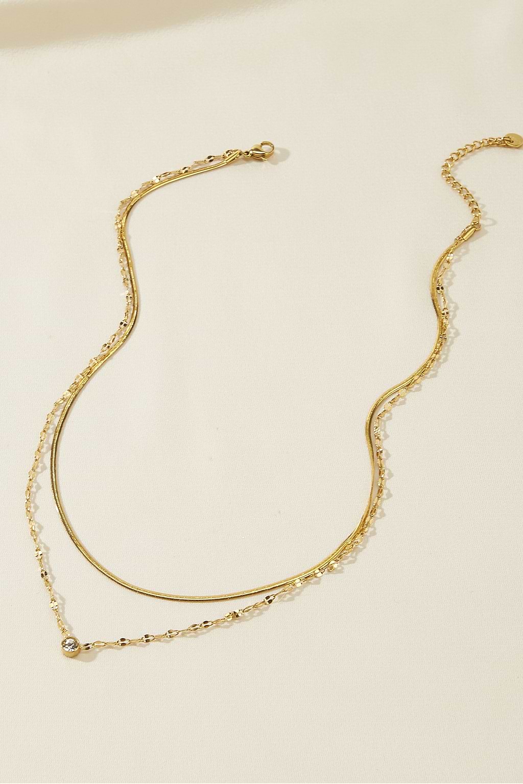 Collier doré avec chaînes variées