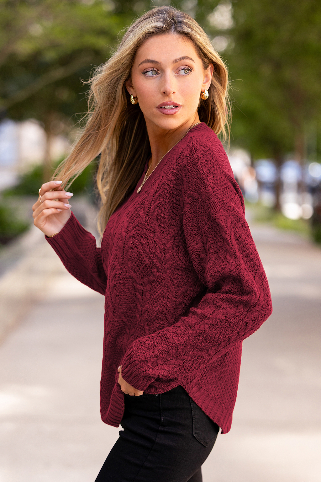 Maglione rosso con marshmallow tostati