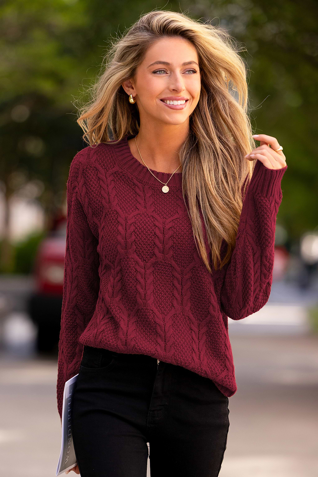 Maglione rosso con marshmallow tostati