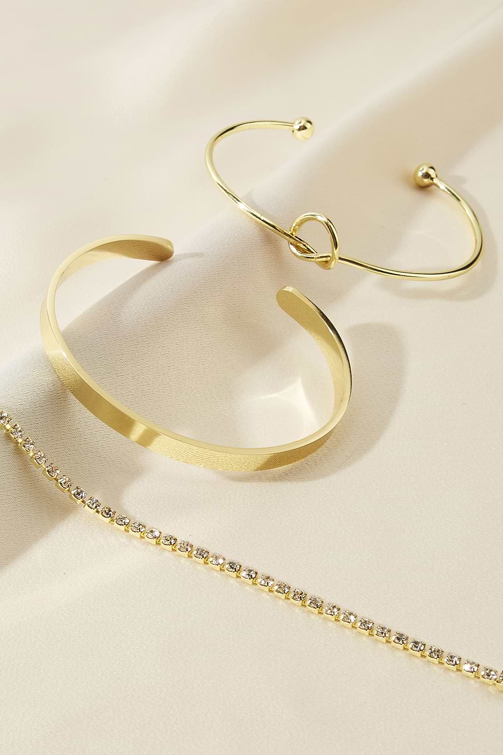 Juego de pulseras Glow for It en tono dorado