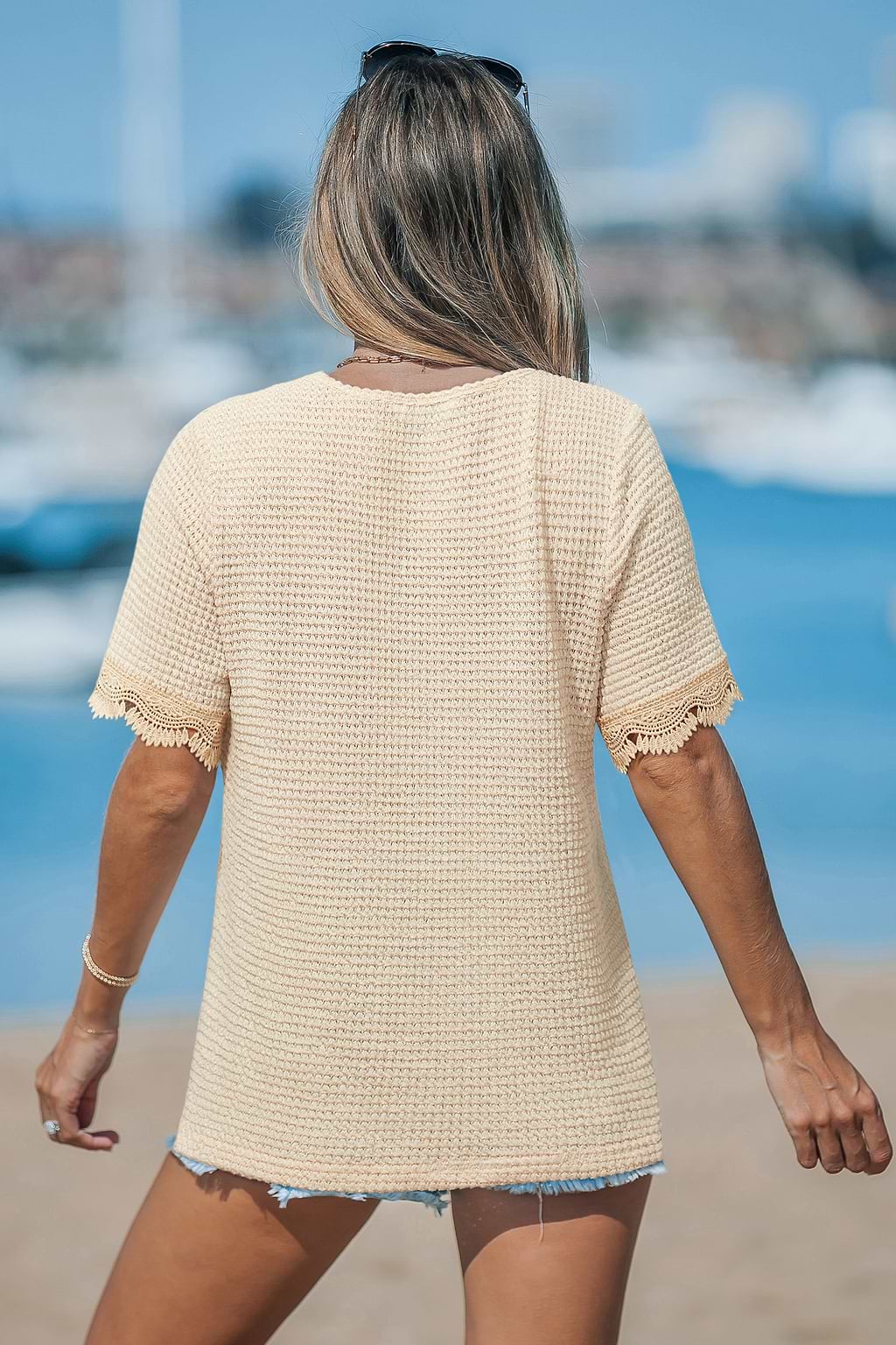 Top beige a flusso naturale