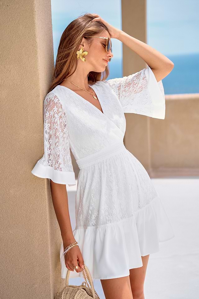 white lace mini dress Neriah Tied Shoulder Can be worn to an elegant daytime event or dressed up for a night out with clear heels ASOS Design - Lace Mini
