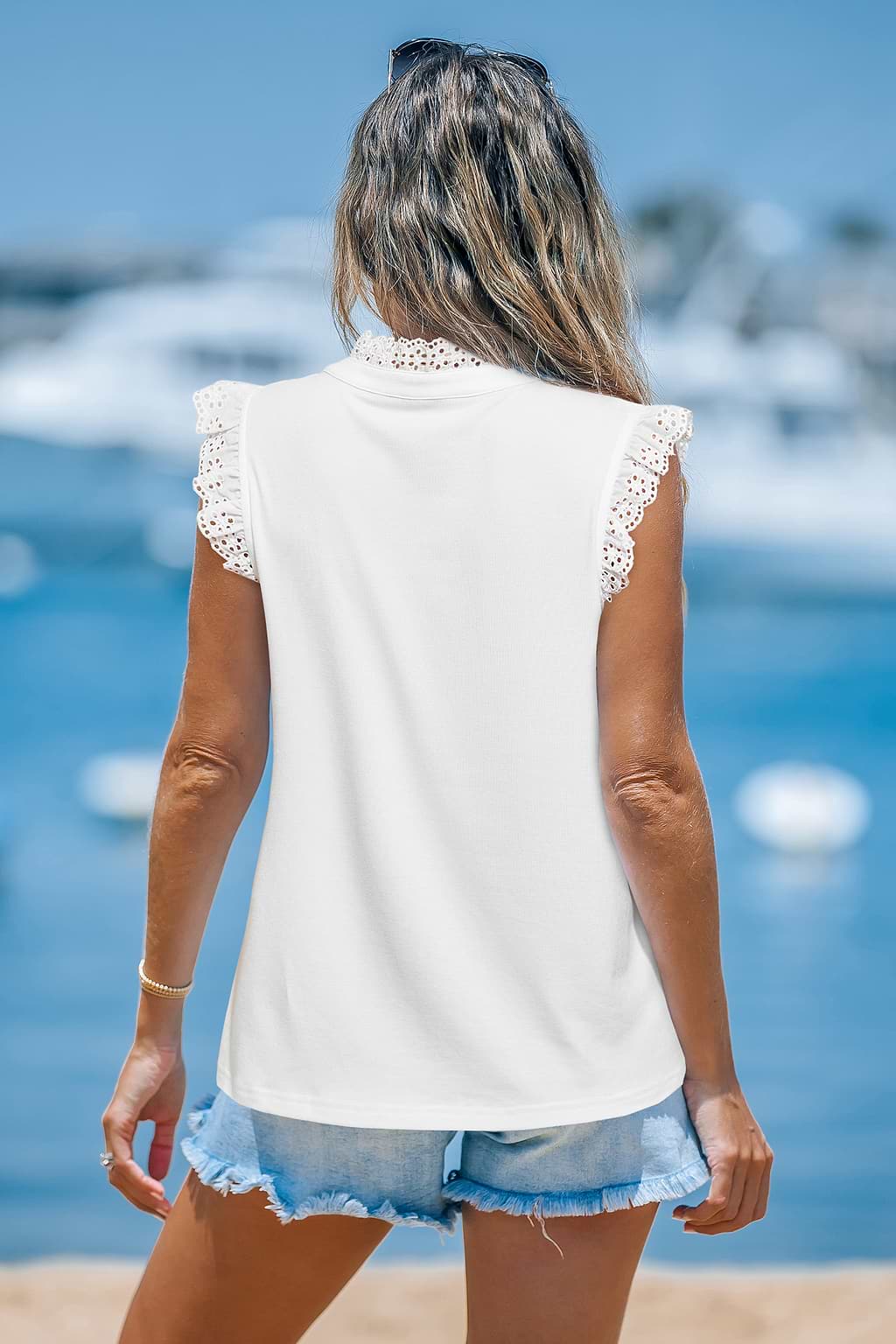 Top blanc garniture ajourée